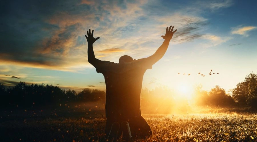 Man holding his hands up reciting The Fifth Step