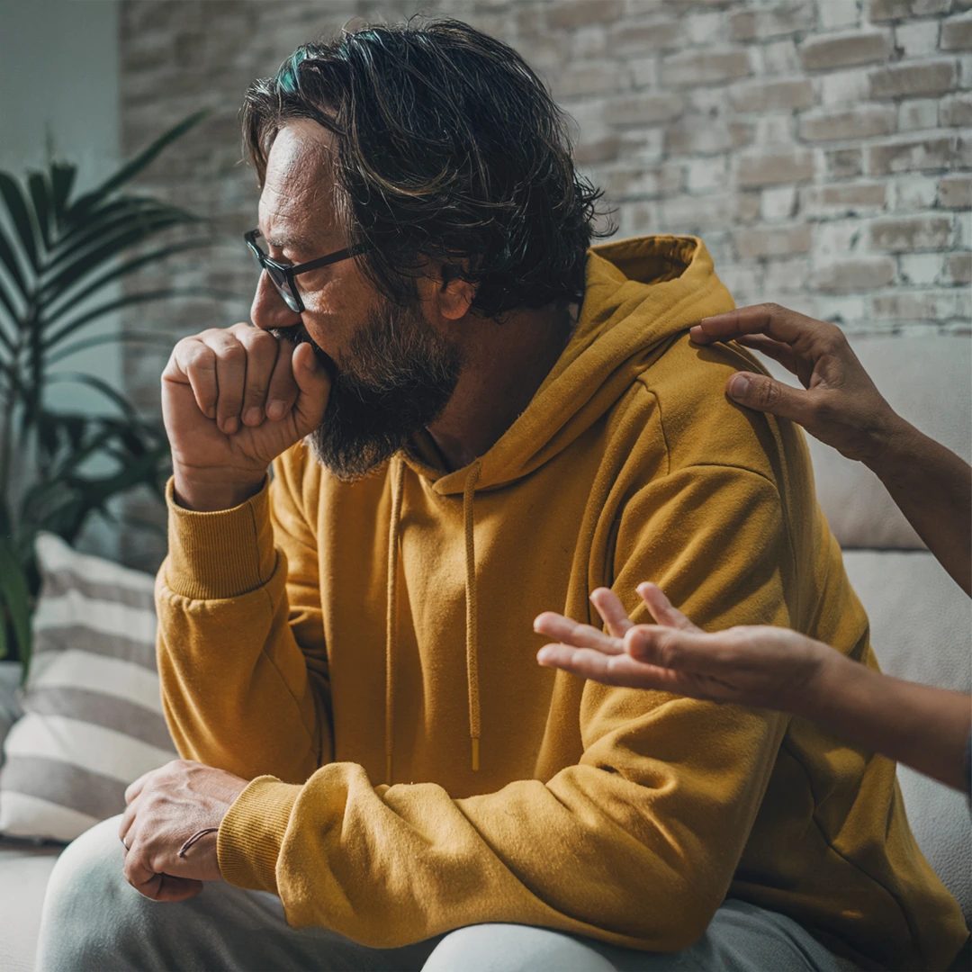 Man struggling with cocaine addiction receiving compassionate support during counseling session at Changes Healing Center in Phoenix, Arizona.